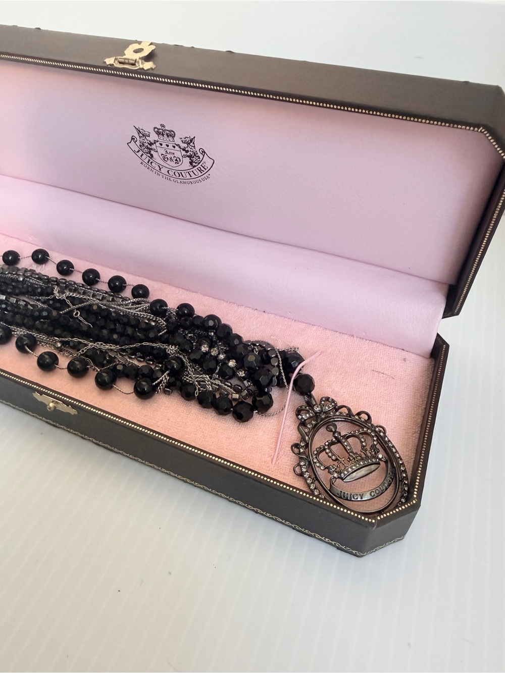 Juicy Couture Black Multi-Strand Beaded Necklace with Crown Pendant